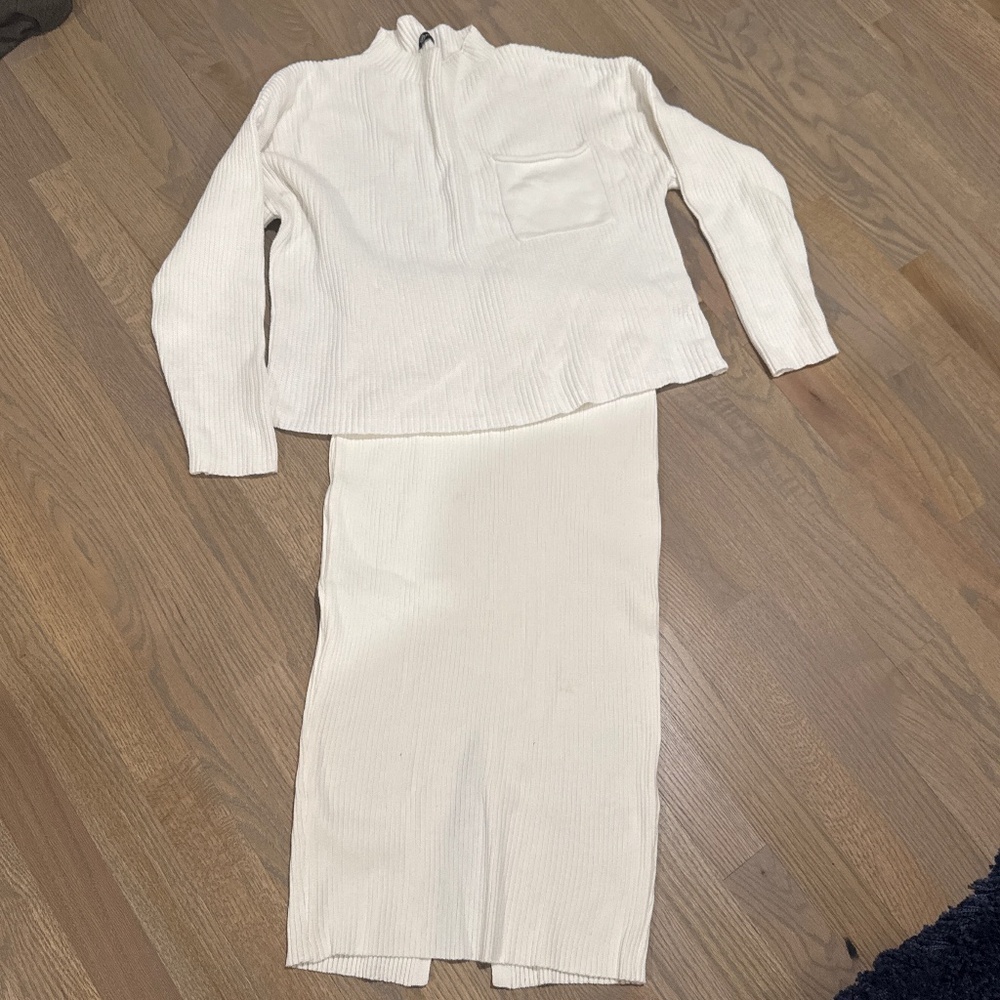 Matching sweater skirt/top. Like New size medium.